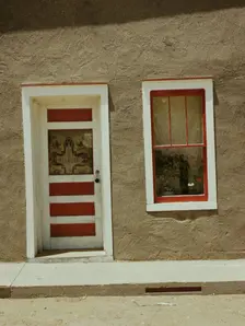Door and window in a Spanish-American home, Costilla, New Mexico, 1940. Creator: Russell Lee