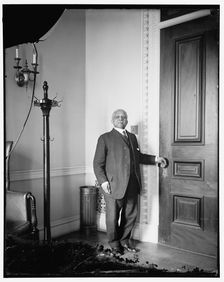 Doorkeeper at State Dept, between 1910 and 1920. Creator: Harris & Ewing
