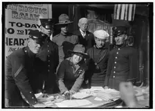 Dora Rodrigues, recruiter for service branches, possibly in front of the Cosmos Theater..., May 1917 Creator: Harris & Ewing