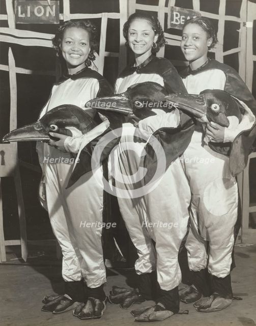 Dorothy Jones, Libby Robinson, and Ruth Moore as penguins, 1937. Creator: Unknown.