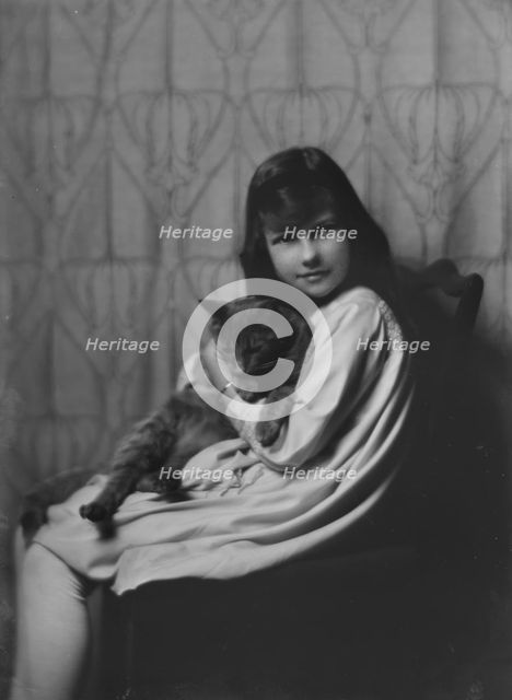 Daughter of Mrs. H Gamble, with cat, portrait photograph, 1917 Nov. 23. Creator: Arnold Genthe.