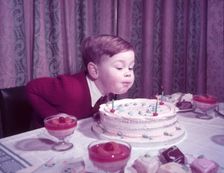 David Clark with birthday cake, c1955. Creator: Arthur Charles Kirby Ware
