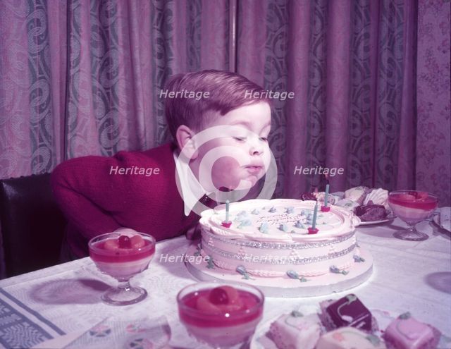 David Clark with birthday cake, c1955. Creator: Arthur Charles Kirby Ware.