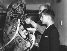 David Reiss inspects a linotype machine at the "Jewish Chronicle", London, 1960. Creator: EH Emanuel