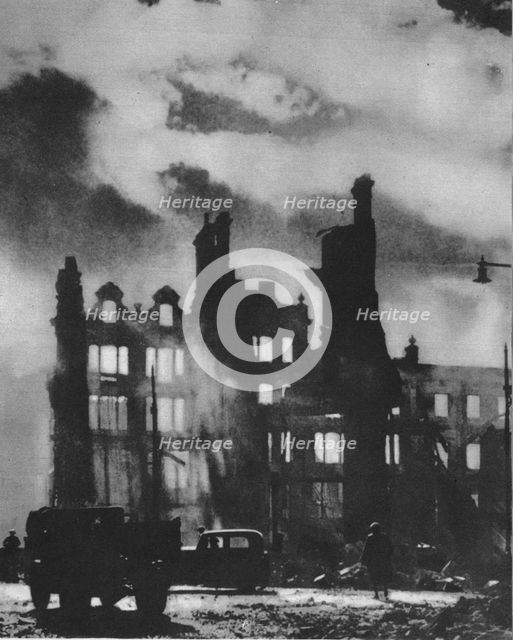 'Dawn Breaks to find the city transfigured after a night of hell', 1941 (1942). Artist: Unknown.