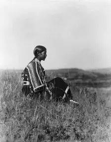 Day dreams-Piegan, c1910. Creator: Edward Sheriff Curtis