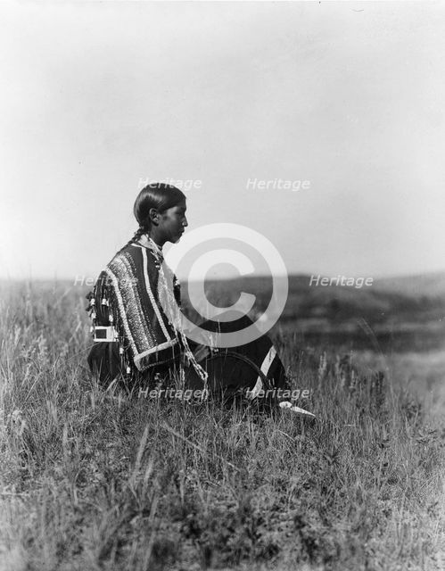Day dreams-Piegan, c1910. Creator: Edward Sheriff Curtis.