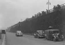 Daimler of CM Simpson and a Morris loudspeaker van on Madeira Drive, Brighton, RAC Rally, 1939. Artist: Bill Brunell