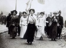 Daisy Dugdale leading a procession, London, 1908. Creator: Unknown