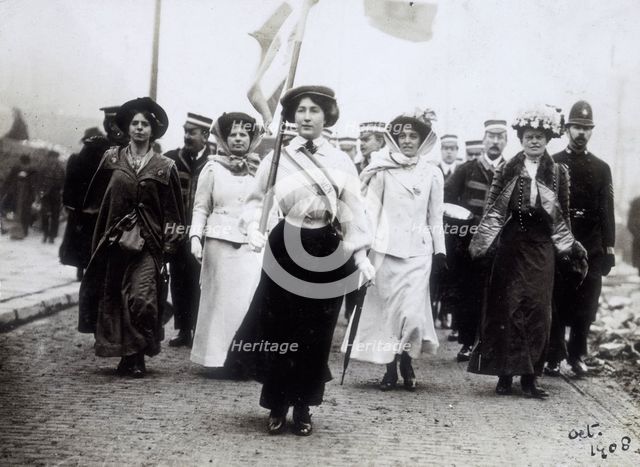 Daisy Dugdale leading a procession, London, 1908.  Creator: Unknown.