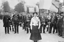 Daisy Dugdale leading the procession to welcome Emmeline and Christabel Pankhurst, London, 1908. Creator: Unknown