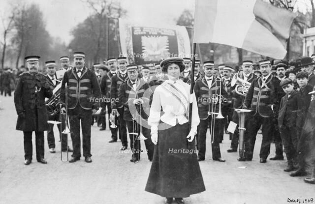 Daisy Dugdale leading the procession to welcome Emmeline and Christabel Pankhurst, London, 1908. Artist: Unknown