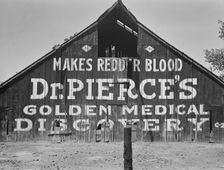 Dairy barn, between Tulare and Fresno, California, 1939. Creator: Dorothea Lange