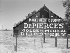 Dairy barn, between Tulare and Fresno, California, 1939. Creator: Dorothea Lange