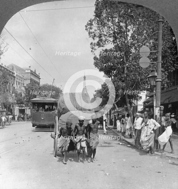 Dalhousie Street, busiest in the city, Rangoon, Burma, 1908. Artist: Stereo Travel Co