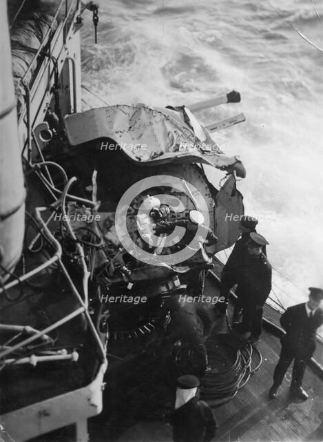 Damaged anti-aircraft gun on the British battleship HMS 'Malaya', off the coast of Portugal, 1937. Artist: Unknown