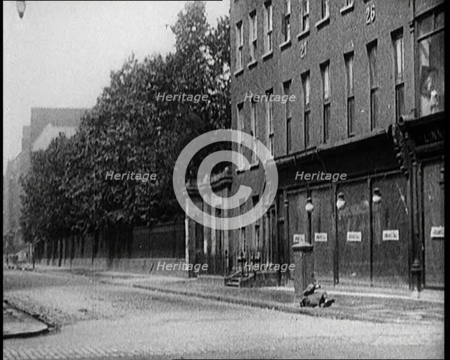 Damaged Buildings and Empty Streets in Dublin as a Result of Fighting, 1922. Creator: British Pathe Ltd.