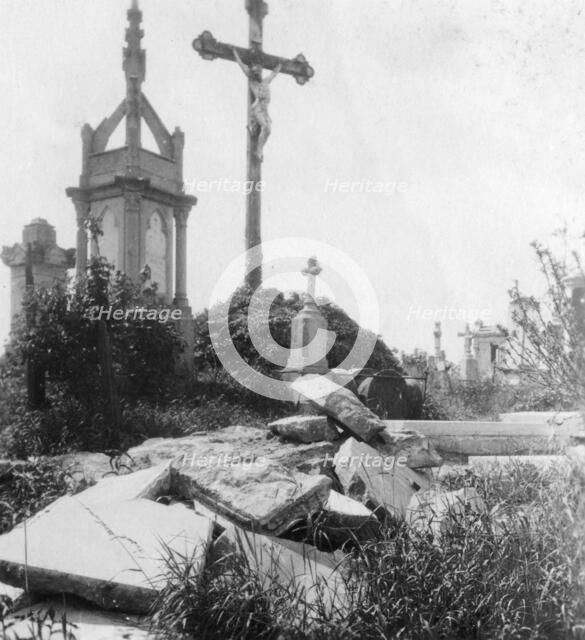 Damaged graves, old communal cemetery, Ypres, Belgium, World War I, c1914-c1918. Artist: Nightingale & Co
