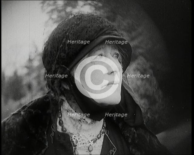 Dame Ellen Terry Standing on a Hill Looking at the View, 1920s. Creator: British Pathe Ltd.