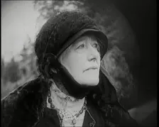 Dame Ellen Terry Standing on a Hill Looking at the View, 1920s. Creator: British Pathe Ltd