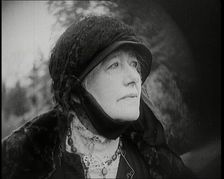 Dame Ellen Terry Standing on a Hill Looking at the View, 1920s. Creator: British Pathe Ltd