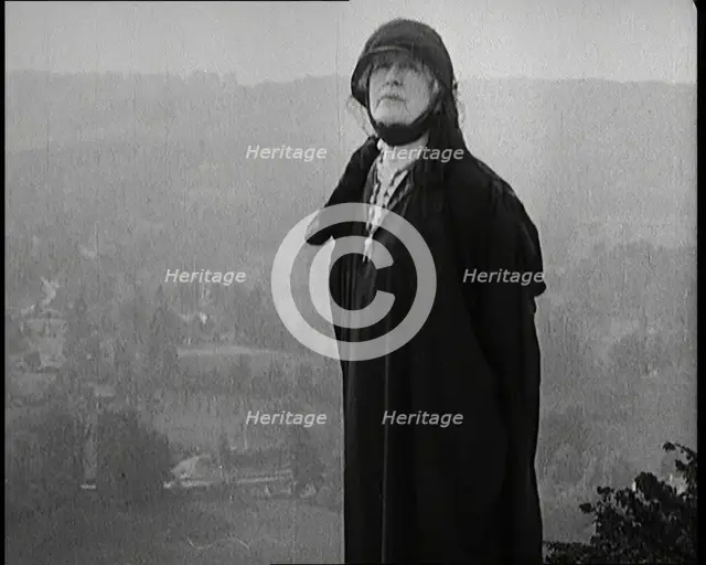 Dame Ellen Terry Standing on a Hill Looking at the View, 1920s. Creator: British Pathe Ltd.