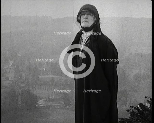 Dame Ellen Terry Standing on a Hill Looking at the View, 1920s. Creator: British Pathe Ltd.