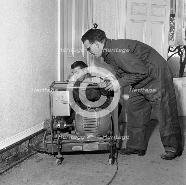 Damp proofing, Goldthorpe, South Yorkshire, 1957. Creator: Michael Walters.
