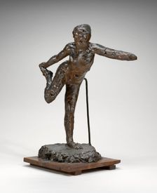 Dancer Holding Her Right Foot in Her Right Hand, possibly 1900/1911. Creator: Edgar Degas