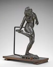 Dancer Looking at the Sole of Her Right Foot, c. 1890s. Creator: Edgar Degas