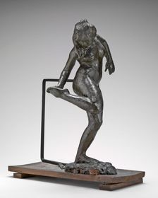Dancer Looking at the Sole of Her Right Foot, c. 1890s. Creator: Edgar Degas