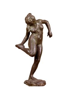 Dancer looking at the sole of her right foot c1890. Creator: Edgar Degas
