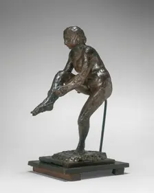 Dancer Putting on Her Stocking, 1890s/1911. Creator: Edgar Degas