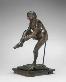 Dancer Putting on Her Stocking, 1890s/1911. Creator: Edgar Degas