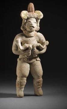 Dancer with Snakes, 1000-500 BCE. Creator: Unknown