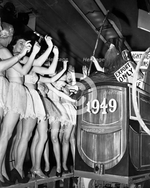 Dancers on New Year's Eve celebrations at the Trocadero Restaurant, Leicester Square, London, 1949. Creator: Unknown.