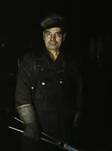 Daniel Anastazia, blacksmith's helper...roundhouse of the Rock Island R.R., Blue Island, Ill., 1943. Creator: Jack Delano