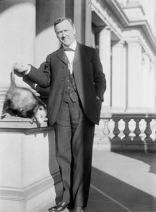 Daniels, Josephus, Secretary of The Navy, 1913-1921. with An Opossum, 1913. Creator: Harris & Ewing