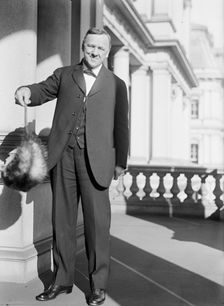 Daniels, Josephus, Secretary of The Navy, 1913-1921. with An Opossum, 1913. Creator: Harris & Ewing