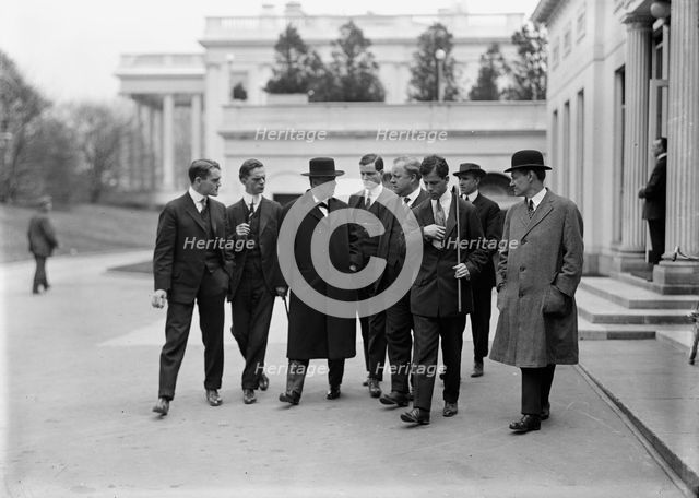 Daniels, Josephus, Secretary of The Navy, 1913-1921. with Newsmen, 1914. Creator: Harris & Ewing.
