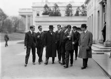 Daniels, Josephus, Secretary of The Navy, 1913-1921. with Newsmen, 1914. Creator: Harris & Ewing