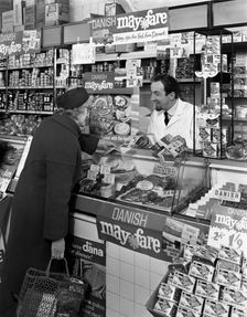 Danish Bacon May Fare shop display, Wath upon Dearne, South Yorkshire, 1964. Creator: Michael Walters
