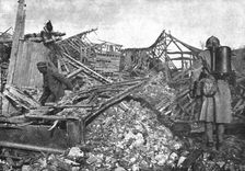 Dans Cantigny; un des derniers Allemands trouves dans les caves du village se degage..., 1918. Creator: Unknown