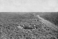 Dans la Bataille; A la guerre de tranchee a succede, pour un temps, la guerre de trous..., 1918. Creator: Unknown