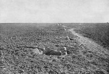 Dans la Bataille; A la guerre de tranchee a succede, pour un temps, la guerre de trous..., 1918. Creator: Unknown