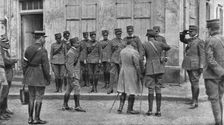 Dans la bataille; presentation au general Franchet d'Esperey de l'etat-major du corps..., 1918. Creator: Unknown