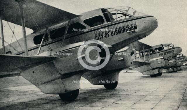 De Havilland DH89 aircraft used on some of the Railway Air Service routes, c1934 (c1937). Artist: Unknown.
