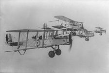 De Havilland DH9 aeroplanes flying in formation, 1923. Artist: Aerofilms
