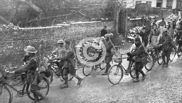 ''De la joie pour Tous; Entoures par les enfants d'un village reconquis, des cyclistes anglais ont i Creator: Unknown.