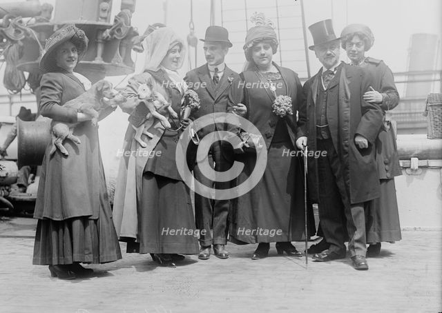 De Rigny and Tety Langy holding dogs, D'Alveres and brother, Oscar and Stella Hammerstein, 1910. Creator: Bain News Service.